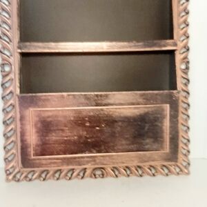 Vintage Style Bronze Sirocco Wall Mounted Mail holder.